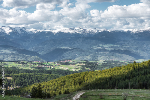 Snowy hills of Rila mountain in Bulgaria during spring, Photo from Rhodope