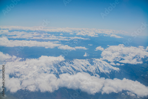 top view of clouds and mountains from the plane © de Art