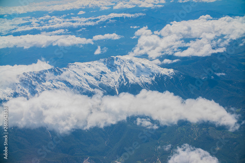 top view of clouds and mountains from the plane © de Art