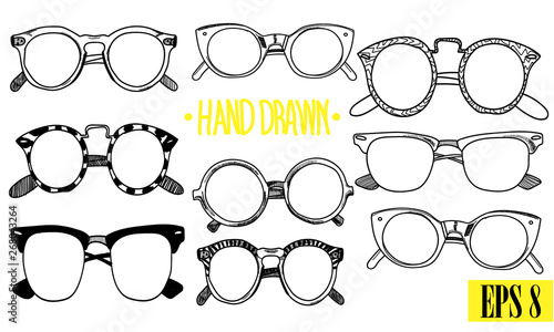 Glasses. A set of images. Drawing by hand in vintage style. Points of different shapes and sizes.