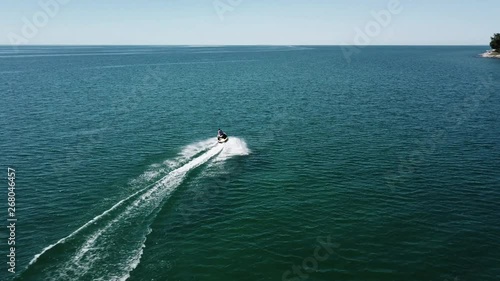 Wallpaper Mural Jet skiing on Lake Huron during the summer in Michigan. Aerial drone footage on a beautiful sunny day. Torontodigital.ca