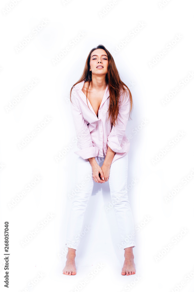 young pretty brunette woman posing emotional happy smiling on white background isolated, lifestyle peole concept young pretty brunette woman posing emotional happy smiling on white background isolated, lifestyle peole concept