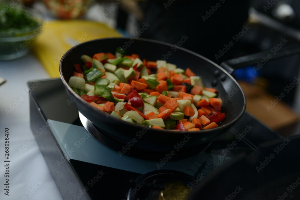 Making dinner at restaurant. Proffesional cooker Making dinner at restaurant. Proffesional cooker