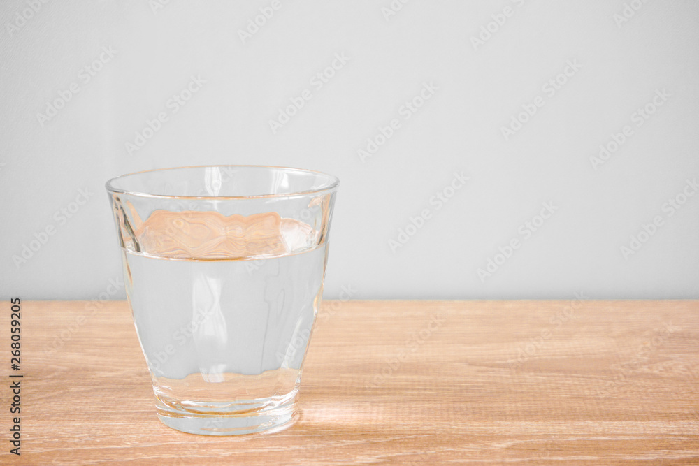 Glass of water on the table. テーブルの上のグラス一杯の水 Glass of water on the table. テーブルの上のグラス一杯の水