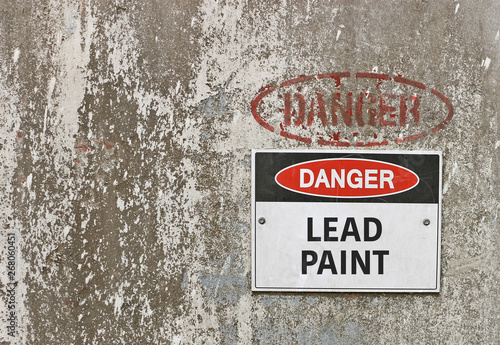 red, black and white Danger, Lead Paint warning sign photo