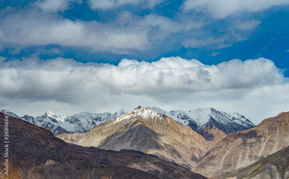 Panorama of the beautiful mountains that surround Leh at sunlight - Ladakh, Jammu and Kashmir, India.
