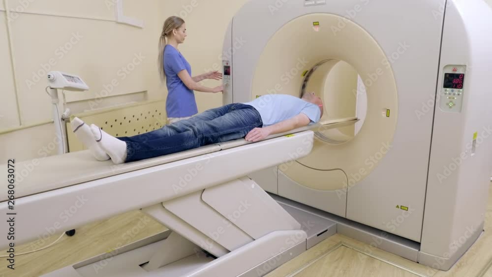 Esteblishen shoot patient is scanned by thomograph Esteblishen shoot patient is scanned by thomograph