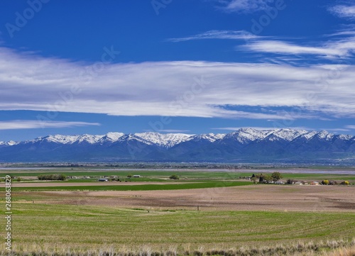 Tremonton and Logan Valley landscape views from Highway 30 pass, including Fielding, Beaverdam, Riverside and Collinston towns, by Utah State University, in Cache County along the Wasatch Front Range  photo