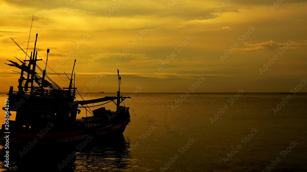 Fishing boat for fishing at sunset