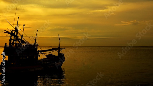 Fishing boat for fishing at sunset