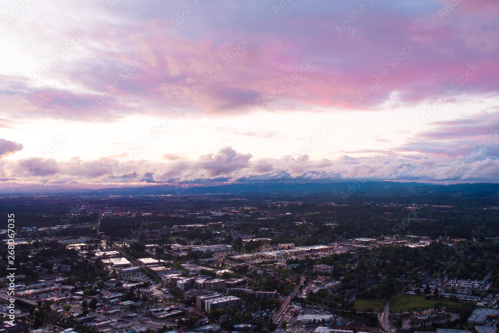 city ​​at sunset after rain, a top view from a quadrocopter