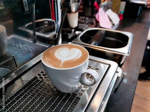 coffee latte art heart on white cups