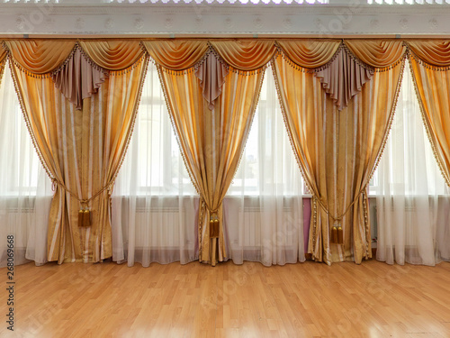 Banquet hall. A building in classical style with windows and curtains