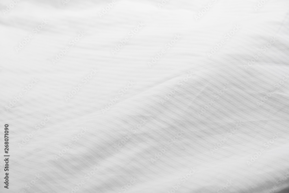 Obraz premium White delicate soft background of fabric or bedding sheet