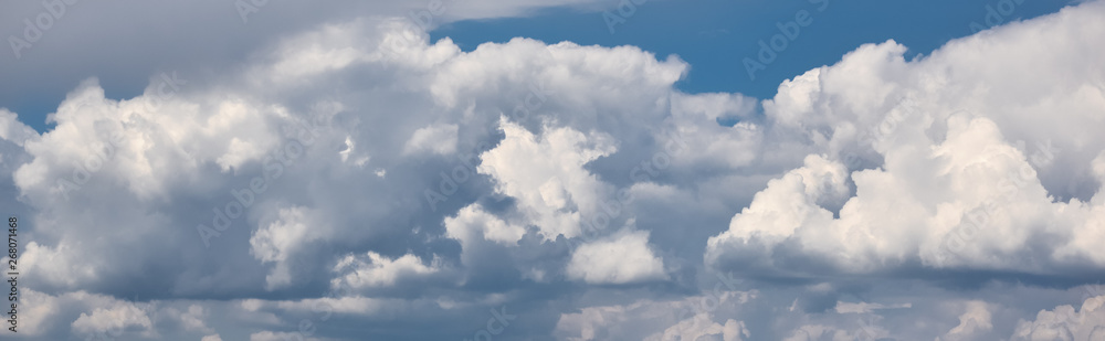 Panoramic view on Sky with dramatic clouds. Fluffy white clouds on the sky suitable for background. Cloudy sky. Overcast Panoramic view on Sky with dramatic clouds. Fluffy white clouds on the sky suitable for background. Cloudy sky. Overcast