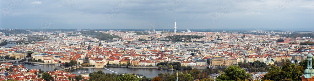 Panoramic view on Charls Bridge, Vltava river, television tower and Prague old town, Czech Republic