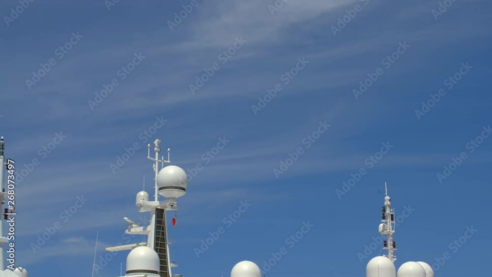 looking at yacht's radars in a marina looking at yacht's radars in a marina