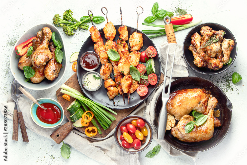 Grilled chicken meat meals on table. Top view Grilled chicken meat meals on table. Top view