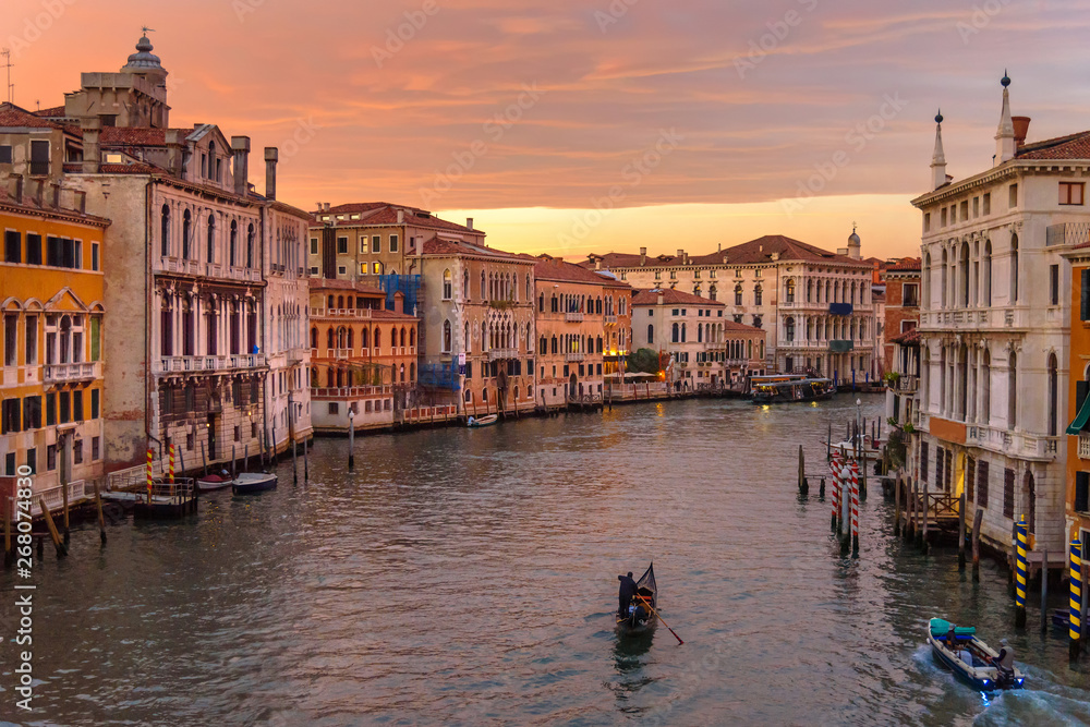 View of Grand Canal from Bridge Ponte dell'Accademia on sunset. Venice. Italy