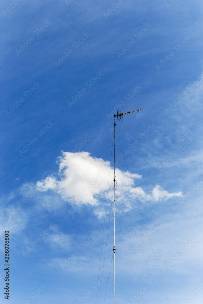 High frequency radio antenna standing high above. High frequency radio antenna standing high above.