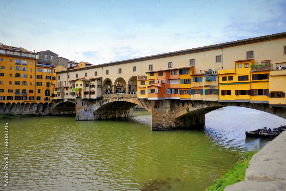 FLORENCE, ITALY-APRIL 29,2019:Ponte Vecchio is a famous medieval bridge over the River Arno in Florence, Italy