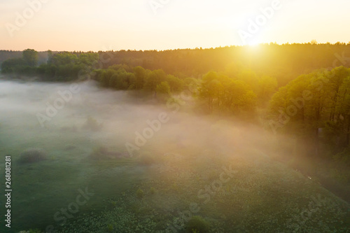 Beautiful misty dawn in the spring on the river.