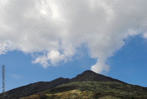 mountain volcano with smoking peak