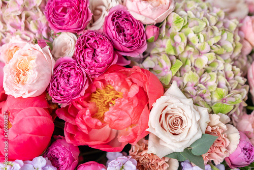 Fototapeta Naklejka Na Ścianę i Meble -  Close-up Large Beautiful bouquet of mixed flowers. Flower background and Wallpaper. Floral shop concept . Beautiful fresh cut bouquet. Flowers delivery