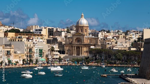 Time lapse view of the town of Kalkara in the bay of Valletta (Malta) photo
