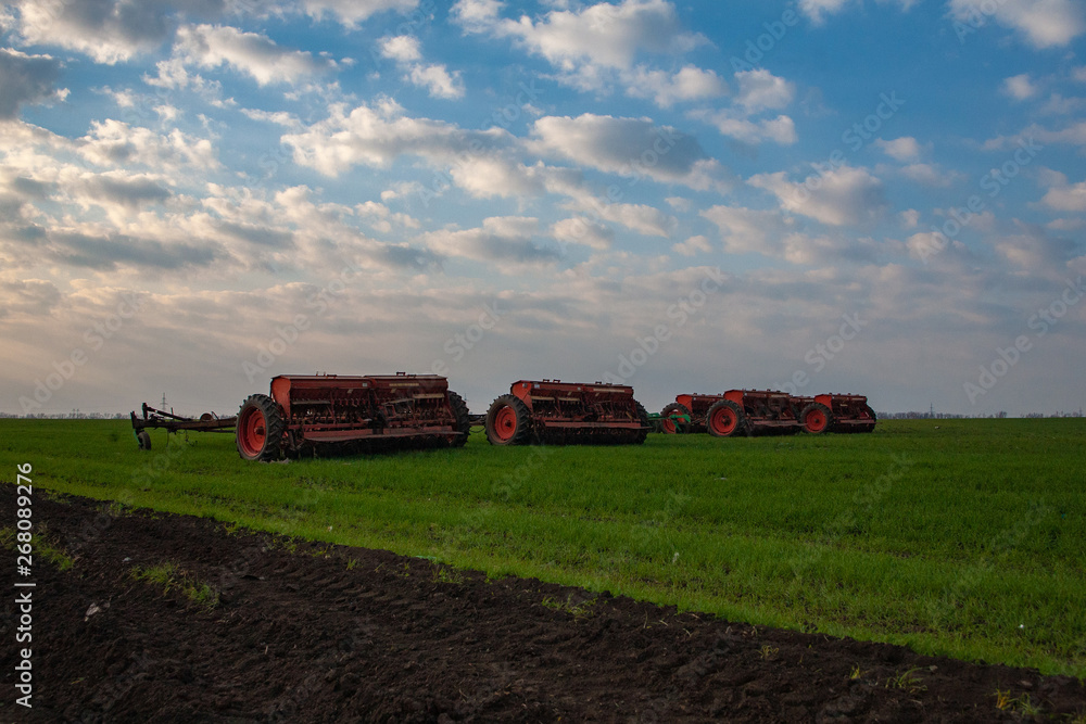 Obraz premium agricultural planter in the field