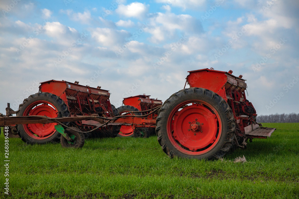 Obraz premium agricultural planter in the field