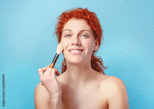 Beautiful redhead woman app...