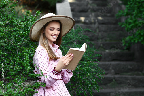 Beautiful young woman readi...