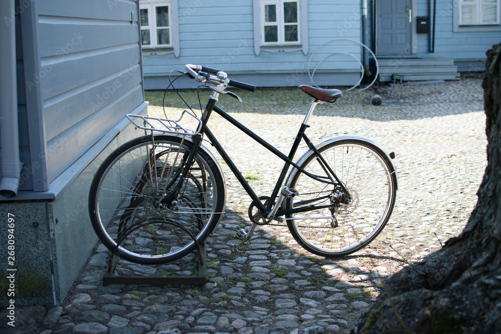 City bike on the background of the house. City bike on the background of the house.