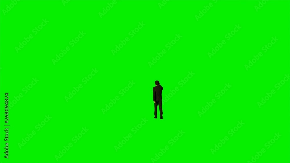 Businessman talking on mobile phone against Green Screen Businessman talking on mobile phone against Green Screen