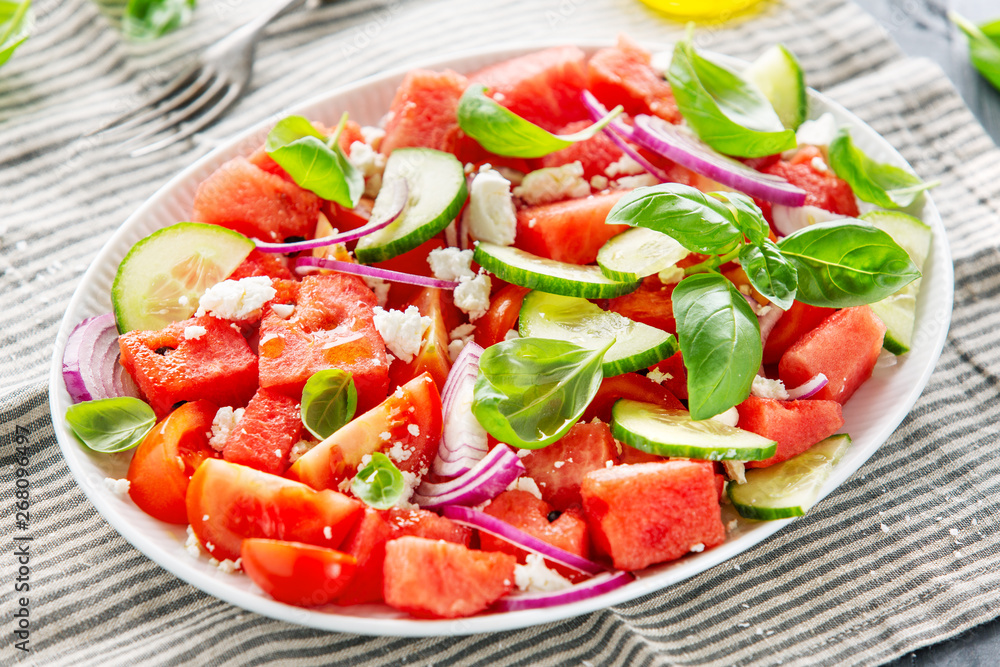 Summer salad with watermelon and salad leaves Summer salad with watermelon and salad leaves