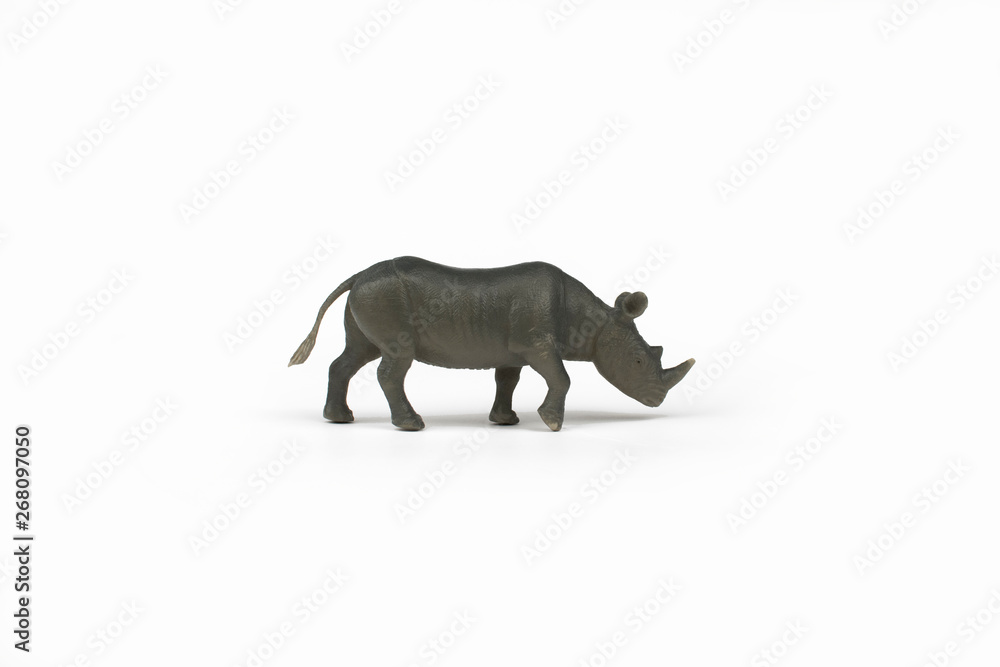 Toy rhino on white background