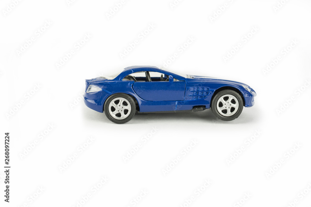 Toy sports blue car on a white background
