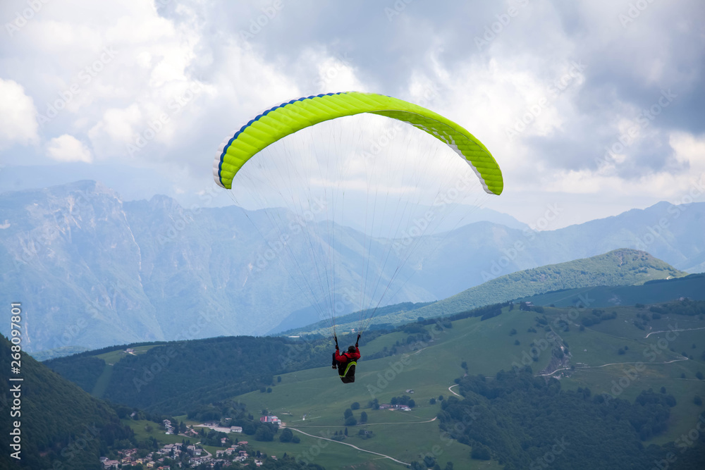 Paragliding over the mountains Paragliding over the mountains