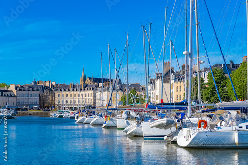 Fotografiet Vannes harbor, in the Morbihan, Brittany, boats in the marina, with typical hous