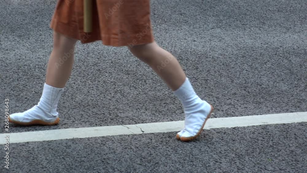TOKYO, JAPAN - 11 MAY 2019 : Close up leg shot of Japanese woman at KANDA MATSURI (KANDA FESTIVAL). One of the three great festivals of Tokyo. Slow motion shot. TOKYO, JAPAN - 11 MAY 2019 : Close up leg shot of Japanese woman at KANDA MATSURI (KANDA FESTIVAL). One of the three great festivals of Tokyo. Slow motion shot.