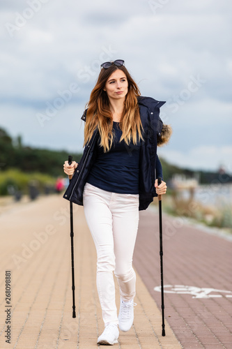 Nordic walking - young woman training