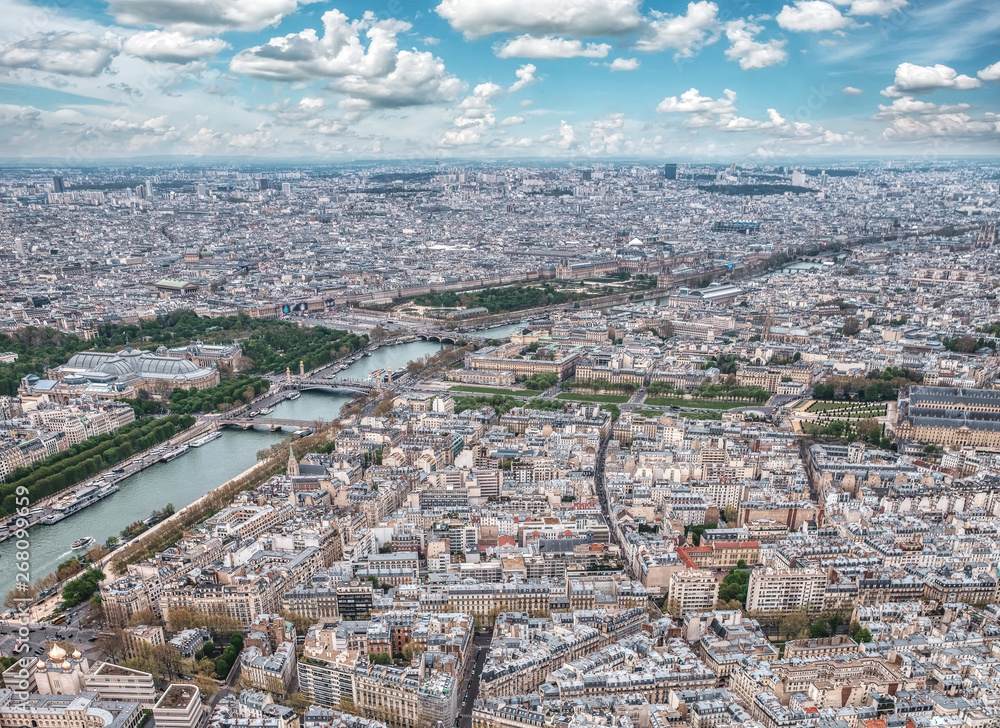Aerial view of famous bridges in Paris. Seine river with Paris architecture in France.