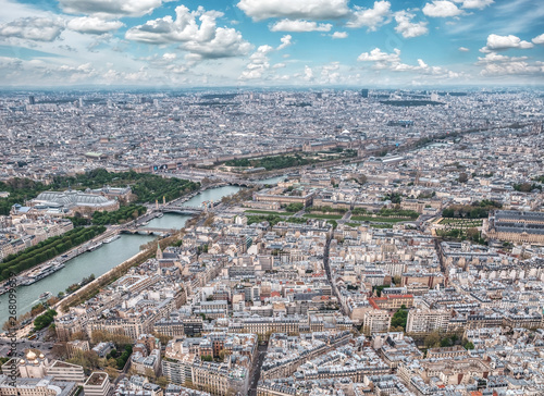 Aerial view of famous bridges in Paris. Seine river with Paris architecture in France. © Augustin Lazaroiu