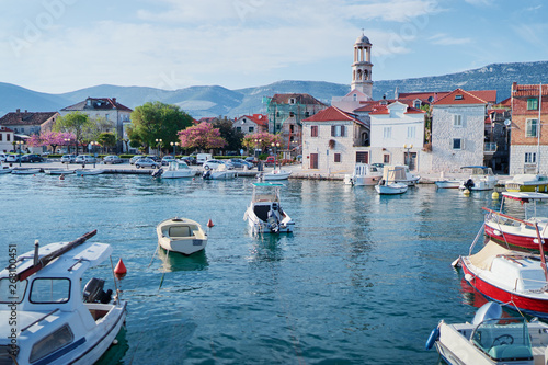 Fototapeta Naklejka Na Ścianę i Meble -  Kastel coast in Dalmatia,Croatia. A famous tourist destination on the Adriatic sea. Fishing boats moored in old town harbor.