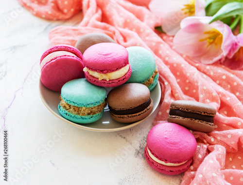 Colorful macaroons and tulips