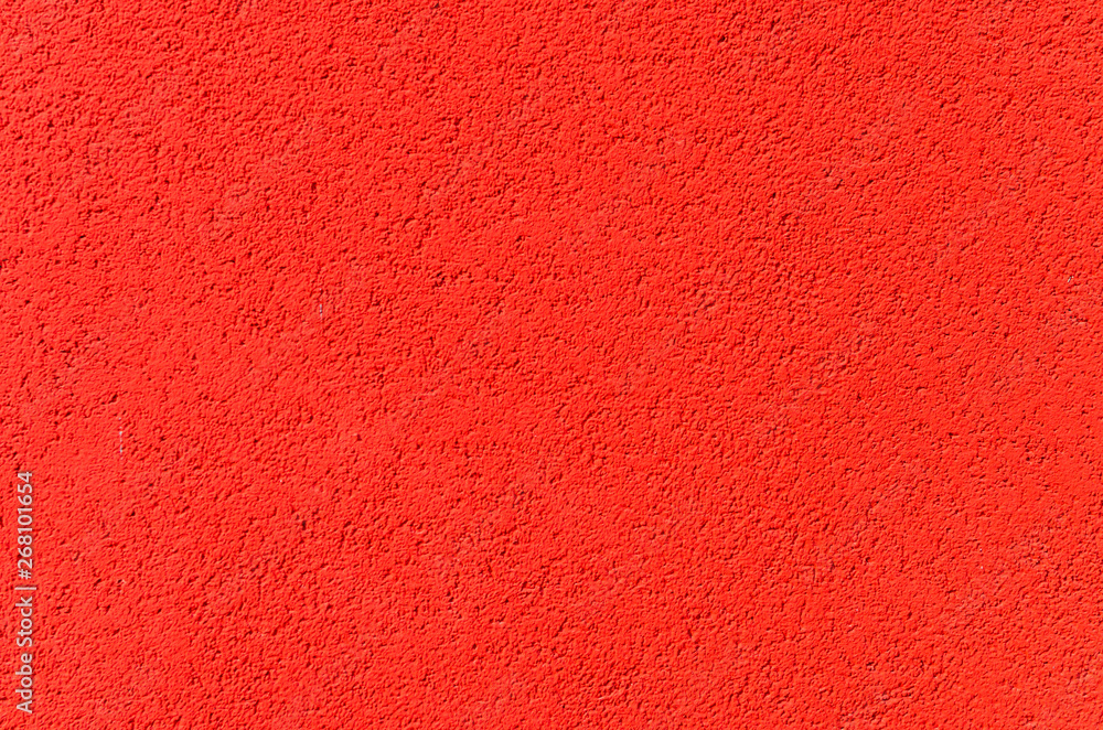 Fototapeta premium The various facing of the front wall of the house is red.