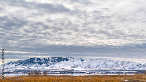 Canvas Print Clear Panorama Dramatic sky filled with cottony clouds over a scenic landscape i