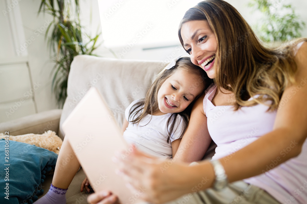 Happy family having fun time at home Happy family having fun time at home