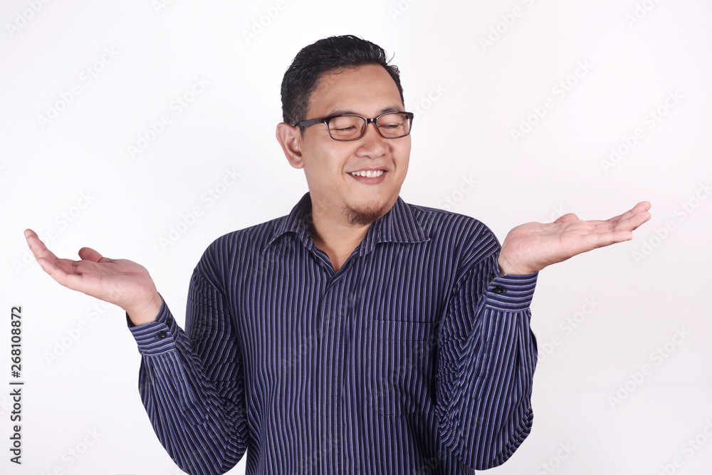 Man Shows Empty Hands, Open Palm with Copy Space. Choose Left or Right Concept Man Shows Empty Hands, Open Palm with Copy Space. Choose Left or Right Concept